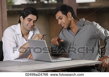 men working at laptop computer View Large Photo Image Stock Photograph - men working at laptop computer. Fotosearch