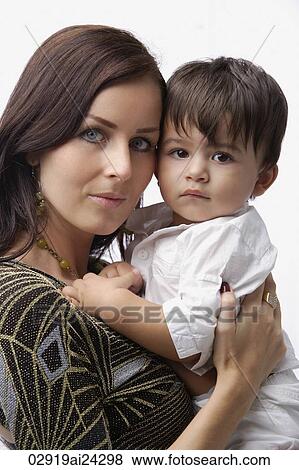Stock Photo - mother holding baby boy. Fotosearch