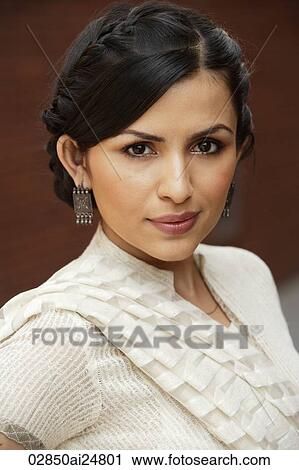 Stock Image - portrait of a pretty woman in sari. Fotosearch
