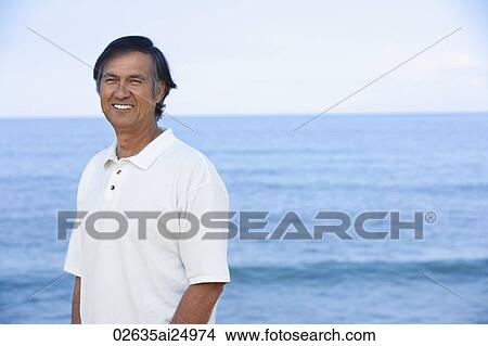 portrait of mature man at beach View Large Photo Image Picture - portrait of mature man at beach. Fotosearch