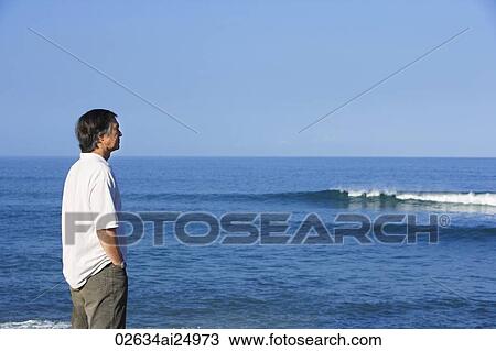 standing on beach View Large Photo Image Stock Image - standing on beach. Fotosearch