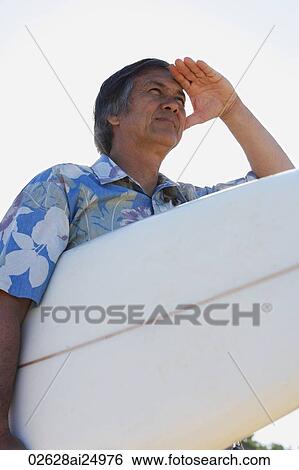 surfer looking at waves View Large Photo Image Stock Photograph - surfer looking at waves. Fotosearch