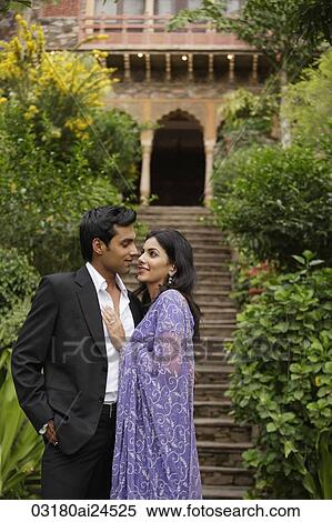 young couple embracing, woman in sari View Large Photo Image Stock Photography - young couple embracing, woman in sari. Fotosearch