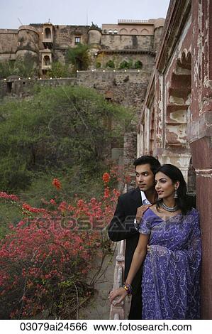 young couple on balcony, woman in sari View Large Photo Image Stock Photograph - young couple on balcony, woman in sari. Fotosearch