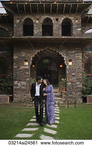 young couple strolling in garden, woman in sari View Large Photo Image Stock Image - young couple strolling in garden, woman in sari. Fotosearch