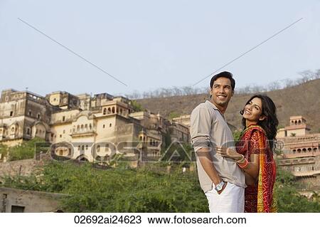 young couple, woman in sari, palace in background View Large Photo Image Stock Image - young couple, woman in sari, palace in background. Fotosearch