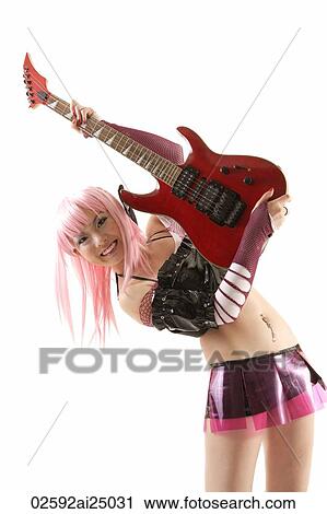 Stock Image - young hip lady bending backward with electric guitar up high, smiling. Fotosearch