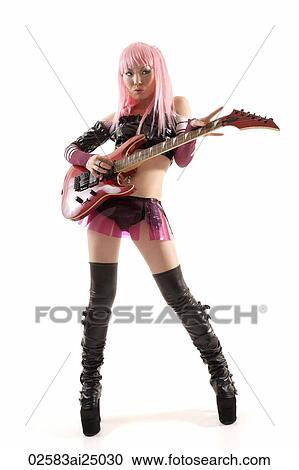 Stock Image - young hip lady playing electric guitar. Fotosearch