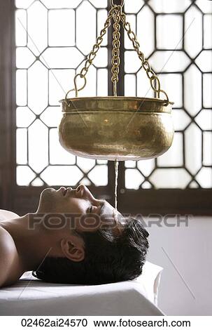 young man having Ayurvedic spa treatment View Large Photo Image Stock Image - young man having Ayurvedic spa treatment. Fotosearch
