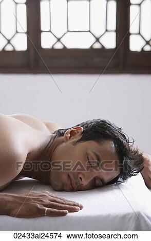 young man on massage table View Large Photo Image Picture - young man on massage table. Fotosearch