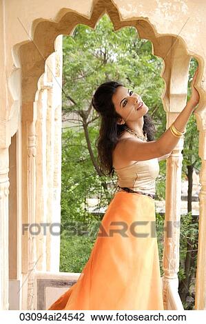 young woman in sari at terrace balcony View Large Photo Image Stock Image - young woman in sari at terrace balcony. Fotosearch