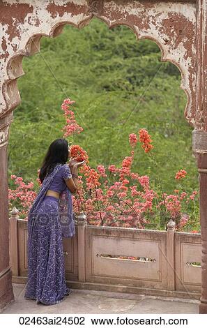 young woman in sari look out from window View Large Photo Image Stock Image - young woman in sari look out from window. Fotosearch