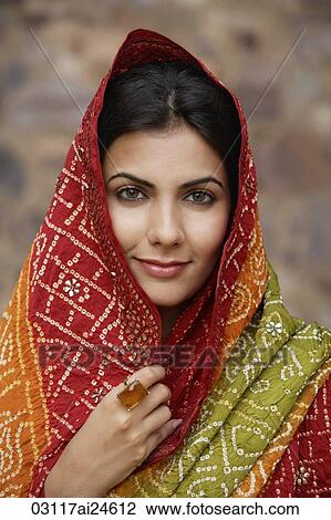 Stock Image - young woman in sari. Fotosearch