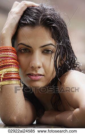 young woman wearing many bangles View Large Photo Image Stock Photography - young woman wearing many bangles. Fotosearch