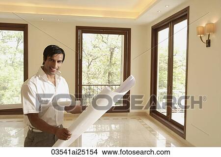architect with blueprints View Large Photo Image Picture - architect with blueprints. Fotosearch