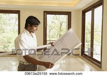 architect with blueprints View Large Photo Image Stock Photography - architect with blueprints. Fotosearch