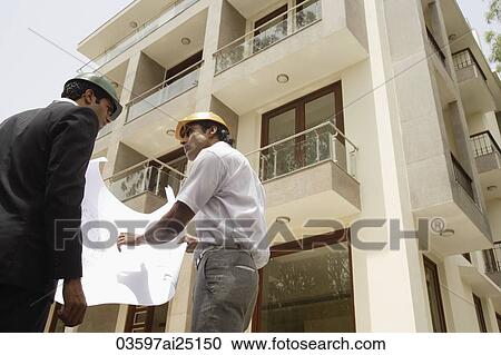 architects looking at plans View Large Photo Image Stock Image - architects looking at plans. Fotosearch