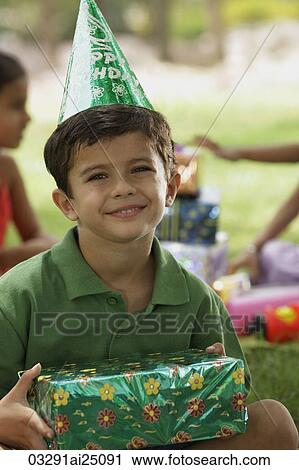 birthday boy with present View Large Photo Image Stock Image - birthday boy with present. Fotosearch