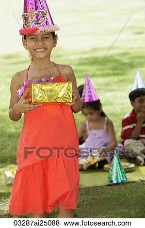 birthday girl with present View Large Photo Image Stock Photo - birthday girl with present. Fotosearch