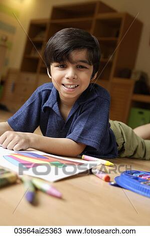 Stock Image - boy coloring. Fotosearch
