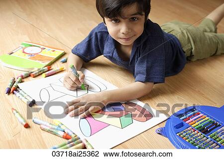 Stock Image - boy coloring. Fotosearch