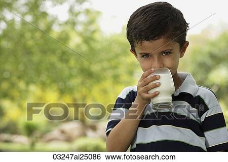 boy drinking glass of milk View Large Photo Image Stock Photograph - boy drinking glass of milk. Fotosearch