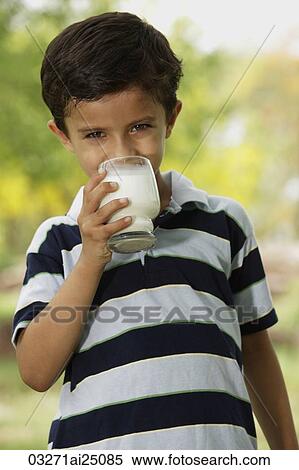 boy drinking glass of milk View Large Photo Image Stock Photography - boy drinking glass of milk. Fotosearch