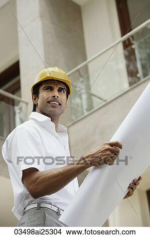 contractor with blueprints View Large Photo Image Picture - contractor with blueprints. Fotosearch