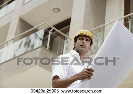 contractor with blueprints View Large Photo Image Stock Photography - contractor with blueprints. Fotosearch