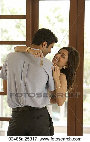 couple embraced, woman with set of keys View Large Photo Image Stock Photo - couple embraced, woman with set of keys. Fotosearch