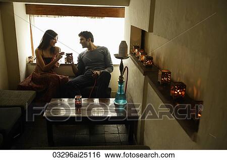 Couple in restaurant View Large Photo Image Stock Photograph - Couple in restaurant. Fotosearch