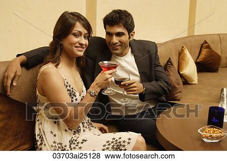 couple making a toast View Large Photo Image Stock Photo - couple making a toast. Fotosearch