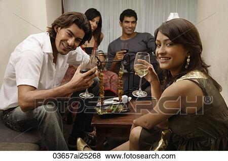 couples enjoying drinks View Large Photo Image Stock Photo - couples enjoying drinks. Fotosearch