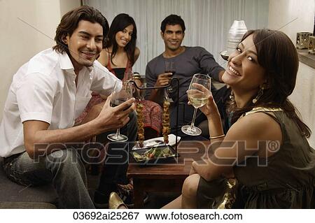 couples enjoying drinks View Large Photo Image Stock Photo - couples enjoying drinks. Fotosearch