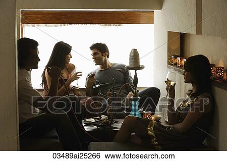 couples enjoying drinks View Large Photo Image Stock Photograph - couples enjoying drinks. Fotosearch