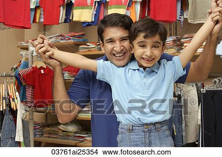 father and son in shop View Large Photo Image Picture - father and son in shop. Fotosearch