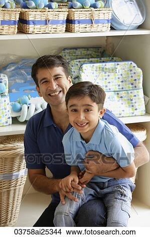 father and son in store View Large Photo Image Picture - father and son in store. Fotosearch