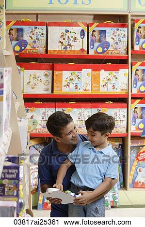 father and son in toy store View Large Photo Image Stock Image - father and son in toy store. Fotosearch
