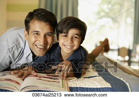 father and son reading book View Large Photo Image Stock Image - father and son reading book. Fotosearch
