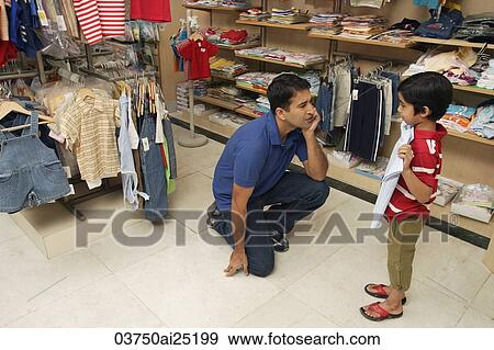 father and son shopping for clothes View Large Photo Image Stock Photo - father and son shopping for clothes. Fotosearch