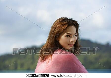 Girl looking back over her shoulder View Large Photo Image Stock Photography - Girl looking back over her shoulder. Fotosearch