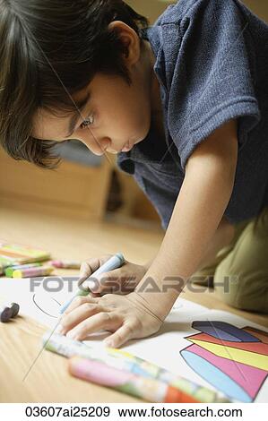 Little boy coloring View Large Photo Image Stock Photo - Little boy coloring. Fotosearch
