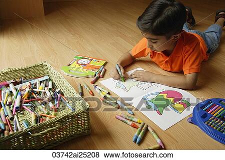 Little boy coloring View Large Photo Image Stock Photo - Little boy coloring. Fotosearch
