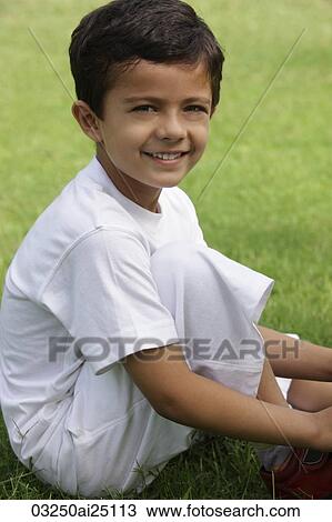 Little boy wearing all white View Large Photo Image Stock Image - Little boy wearing all white. Fotosearch