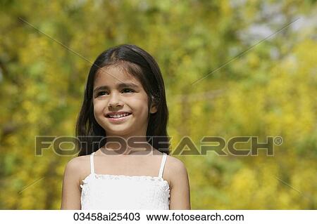 Stock Image - little girl in park. Fotosearch