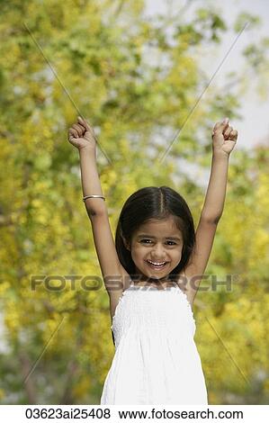 Stock Photo - little girl in park. Fotosearch