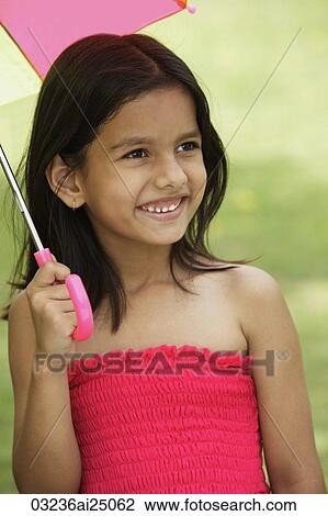 little girl in pink dress, with umbrella View Large Photo Image Stock Image - little girl in pink dress, with umbrella. Fotosearch