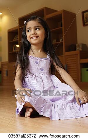 little girl in purple dress View Large Photo Image Stock Image - little girl in purple dress. Fotosearch