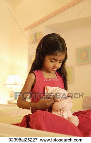 little girl on bed with teddy bear View Large Photo Image Stock Photo - little girl on bed with teddy bear. Fotosearch