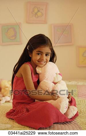little girl on bed with teddy bear View Large Photo Image Stock Photo - little girl on bed with teddy bear. Fotosearch